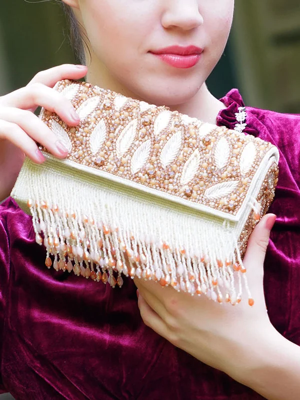 Odette Women Hi-Shine Gold And White Tasseled Clutch Bag Don't Miss Out – Shop Fashionable Bags At Special Rates Odette Women Hi-Shine Gold And White Tasseled Clutch Bag Don't Miss Out – Shop Fashionable Bags At Special Rates