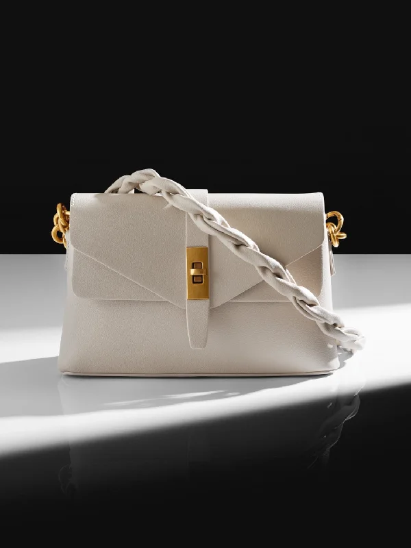 Minimalist Leather Bag For Modern Aesthetics Women Beige Solid Structured Sling Bag with Front Lock Detail Your Perfect Bag At The Perfect Price Minimalist Leather Bag For Modern Aesthetics Women Beige Solid Structured Sling Bag with Front Lock Detail Your Perfect Bag At The Perfect Price